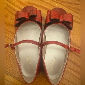 Girls red glitter dress shoes with a bow. Size 10 Mary Jane style